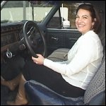 Audrey Revving the Bronco in Boots & Barefoot