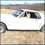 Stormy Driving her Mustang in the Field