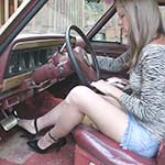 Elizabeth Cranking Up the Jeep in Black Patent Stiletto Pumps