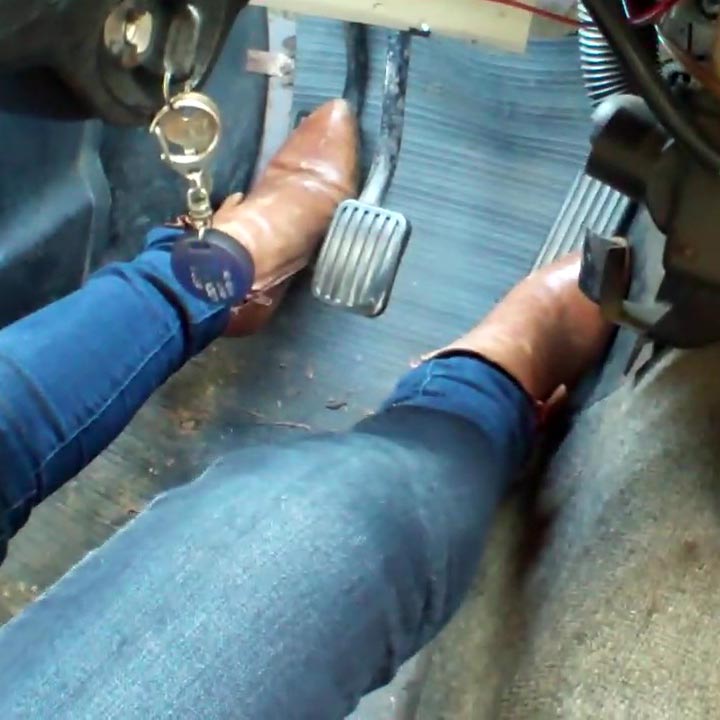 Mari Cranks & Hard Revs the Volvo in Heeled Tan Leather Booties